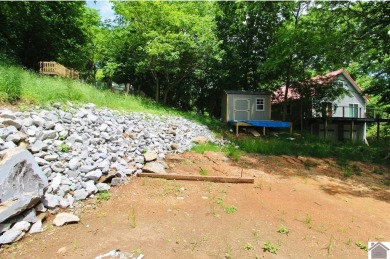 Discover an exceptional opportunity to build your dream home on Mineral Mound Golf Course in Kentucky - for sale on GolfHomes.com, golf home, golf lot
