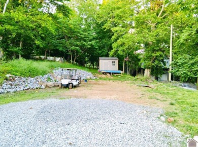 Discover an exceptional opportunity to build your dream home on Mineral Mound Golf Course in Kentucky - for sale on GolfHomes.com, golf home, golf lot