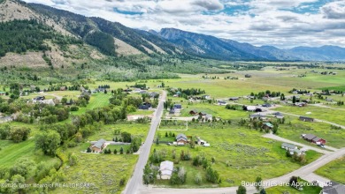 Great corner lot offering expansive mountain views and all the on Cedar Creek Golf Course in Wyoming - for sale on GolfHomes.com, golf home, golf lot