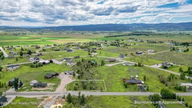 Great corner lot offering expansive mountain views and all the on Cedar Creek Golf Course in Wyoming - for sale on GolfHomes.com, golf home, golf lot