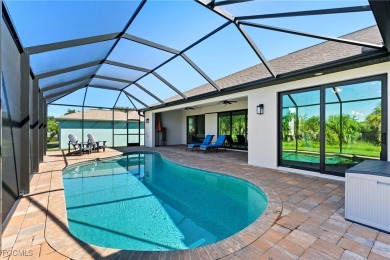 Built in 2023, this immaculate home offers soaring 14-ft on Rotonda Golf and Country Club - Long Marsh  in Florida - for sale on GolfHomes.com, golf home, golf lot