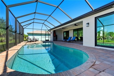 Built in 2023, this immaculate home offers soaring 14-ft on Rotonda Golf and Country Club - Long Marsh  in Florida - for sale on GolfHomes.com, golf home, golf lot