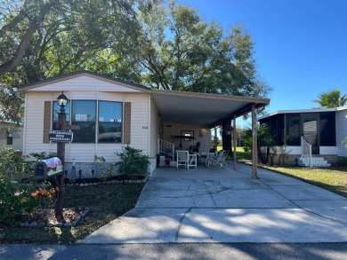 This 2/2 home will be offered fully furnished and it includes on Lake Henry Golf Club in Florida - for sale on GolfHomes.com, golf home, golf lot