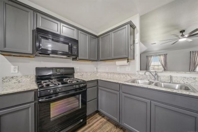 Tucked away in a well-established neighborhood and less than a on White Hawk Golf Club in Oklahoma - for sale on GolfHomes.com, golf home, golf lot