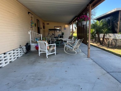 This 2/2 home will be offered fully furnished and it includes on Lake Henry Golf Club in Florida - for sale on GolfHomes.com, golf home, golf lot