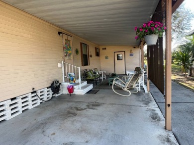 This 2/2 home will be offered fully furnished and it includes on Lake Henry Golf Club in Florida - for sale on GolfHomes.com, golf home, golf lot