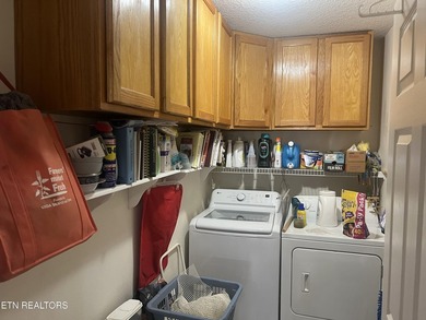 Discover this nicely maintained home on a combined double lot on Lake Tansi Village Country Club in Tennessee - for sale on GolfHomes.com, golf home, golf lot