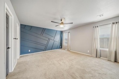 Tucked away in a well-established neighborhood and less than a on White Hawk Golf Club in Oklahoma - for sale on GolfHomes.com, golf home, golf lot