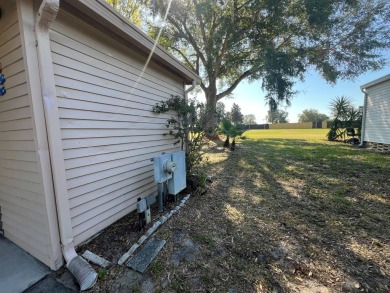 This 2/2 home will be offered fully furnished and it includes on Lake Henry Golf Club in Florida - for sale on GolfHomes.com, golf home, golf lot
