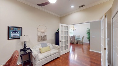 Welcome to this charming 2-bedroom, 2-bathroom villa with a den on Cypress Lake Country Club in Florida - for sale on GolfHomes.com, golf home, golf lot