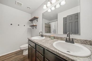 Tucked away in a well-established neighborhood and less than a on White Hawk Golf Club in Oklahoma - for sale on GolfHomes.com, golf home, golf lot