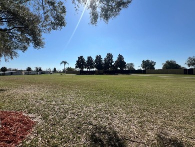 This 2/2 home will be offered fully furnished and it includes on Lake Henry Golf Club in Florida - for sale on GolfHomes.com, golf home, golf lot