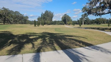 ENJOY RESORT STYLE LIVING AT A FRACTION OF THE COST! This on Water Oak Country Club Estates in Florida - for sale on GolfHomes.com, golf home, golf lot