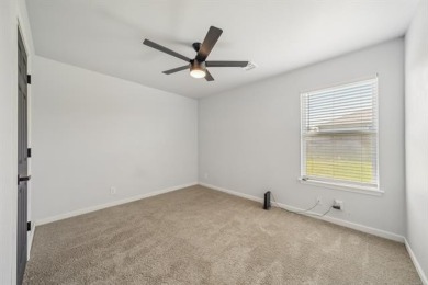 Tucked away in a well-established neighborhood and less than a on White Hawk Golf Club in Oklahoma - for sale on GolfHomes.com, golf home, golf lot