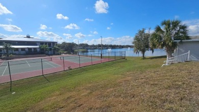 ENJOY RESORT STYLE LIVING AT A FRACTION OF THE COST! This on Water Oak Country Club Estates in Florida - for sale on GolfHomes.com, golf home, golf lot