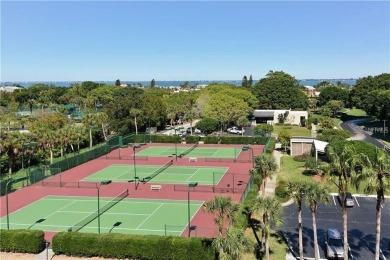 Step out the door and onto the beach in a short walk from this on Links on Longboat Golf Club in Florida - for sale on GolfHomes.com, golf home, golf lot