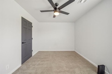 Tucked away in a well-established neighborhood and less than a on White Hawk Golf Club in Oklahoma - for sale on GolfHomes.com, golf home, golf lot
