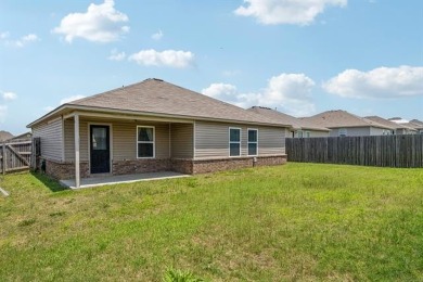 Tucked away in a well-established neighborhood and less than a on White Hawk Golf Club in Oklahoma - for sale on GolfHomes.com, golf home, golf lot