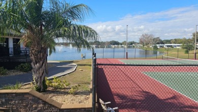 ENJOY RESORT STYLE LIVING AT A FRACTION OF THE COST! This on Water Oak Country Club Estates in Florida - for sale on GolfHomes.com, golf home, golf lot