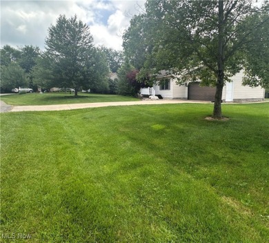 Spacious ranch home offering 3 bedrooms, 2 full baths, and an on Apple Valley Golf Course in Ohio - for sale on GolfHomes.com, golf home, golf lot