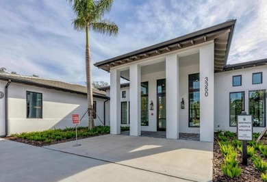 Absolute stunner and an exceptional value. This fully remodeled on The Meadows Golf and Country Club in Florida - for sale on GolfHomes.com, golf home, golf lot