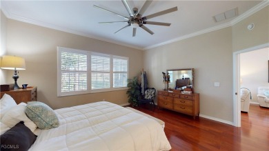 Welcome to this charming 2-bedroom, 2-bathroom villa with a den on Cypress Lake Country Club in Florida - for sale on GolfHomes.com, golf home, golf lot