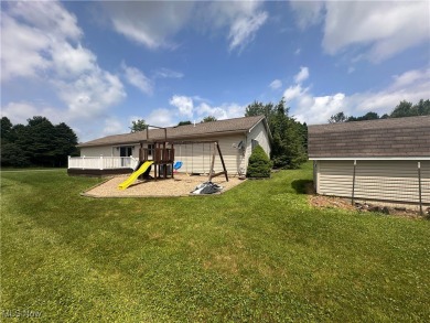 Spacious ranch home offering 3 bedrooms, 2 full baths, and an on Apple Valley Golf Course in Ohio - for sale on GolfHomes.com, golf home, golf lot