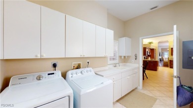 Welcome to this charming 2-bedroom, 2-bathroom villa with a den on Cypress Lake Country Club in Florida - for sale on GolfHomes.com, golf home, golf lot