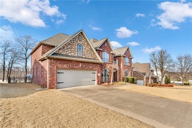 Stunning two-level home in a desirable Springdale location with on Springdale Country Club in Arkansas - for sale on GolfHomes.com, golf home, golf lot