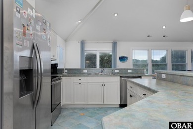 *Seas the day* is a beautifully maintained reverse-floor plan on The Currituck Golf Club in North Carolina - for sale on GolfHomes.com, golf home, golf lot