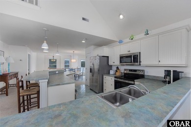 *Seas the day* is a beautifully maintained reverse-floor plan on The Currituck Golf Club in North Carolina - for sale on GolfHomes.com, golf home, golf lot