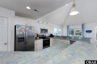 *Seas the day* is a beautifully maintained reverse-floor plan on The Currituck Golf Club in North Carolina - for sale on GolfHomes.com, golf home, golf lot