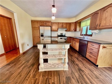 This beautiful ranch home sits on over half an acre and boasts on Green Ridge Golf Course in Ohio - for sale on GolfHomes.com, golf home, golf lot