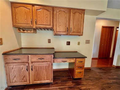 This beautiful ranch home sits on over half an acre and boasts on Green Ridge Golf Course in Ohio - for sale on GolfHomes.com, golf home, golf lot