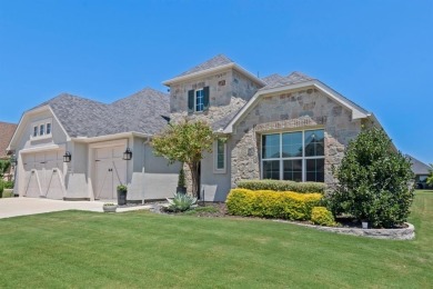 This popular Aubrey floor plan  is located on a quiet street on Wildhorse Golf Club of Robson Ranch in Texas - for sale on GolfHomes.com, golf home, golf lot