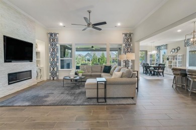 This popular Aubrey floor plan  is located on a quiet street on Wildhorse Golf Club of Robson Ranch in Texas - for sale on GolfHomes.com, golf home, golf lot