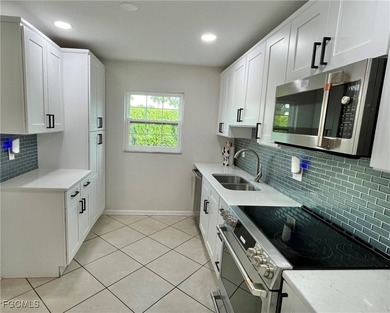 **WOW! A CORNER LOT*DBL GARAGE* AND AN EXTRA 2 SPACE PARKING on Cypress Lake Country Club in Florida - for sale on GolfHomes.com, golf home, golf lot