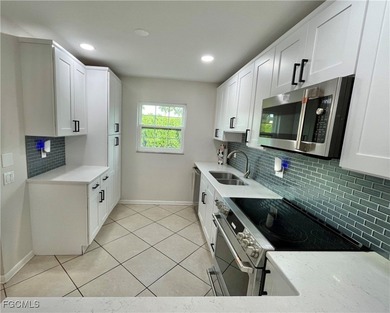 **WOW! A CORNER LOT*DBL GARAGE* AND AN EXTRA 2 SPACE PARKING on Cypress Lake Country Club in Florida - for sale on GolfHomes.com, golf home, golf lot