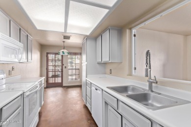 Large two bedroom, two bath townhome with a one car garage on Scottsdale Silverado Golf Club in Arizona - for sale on GolfHomes.com, golf home, golf lot