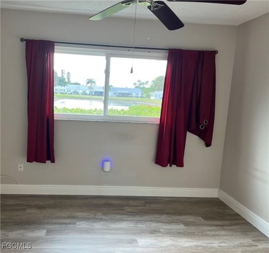 **WOW! A CORNER LOT*DBL GARAGE* AND AN EXTRA 2 SPACE PARKING on Cypress Lake Country Club in Florida - for sale on GolfHomes.com, golf home, golf lot