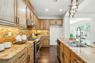 Discover timeless elegance at 4331 Altivo Lane, Corona - a on Glen Ivy Golf Club in California - for sale on GolfHomes.com, golf home, golf lot