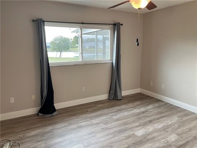 **WOW! A CORNER LOT*DBL GARAGE* AND AN EXTRA 2 SPACE PARKING on Cypress Lake Country Club in Florida - for sale on GolfHomes.com, golf home, golf lot