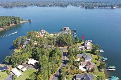 This is a prime waterfront property with long-range views and an on The Patriot Golf Club At Grand Harbor in South Carolina - for sale on GolfHomes.com, golf home, golf lot