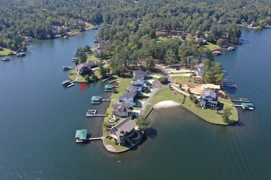 This is a prime waterfront property with long-range views and an on The Patriot Golf Club At Grand Harbor in South Carolina - for sale on GolfHomes.com, golf home, golf lot