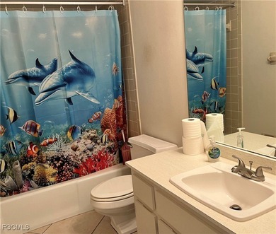 **WOW! A CORNER LOT*DBL GARAGE* AND AN EXTRA 2 SPACE PARKING on Cypress Lake Country Club in Florida - for sale on GolfHomes.com, golf home, golf lot