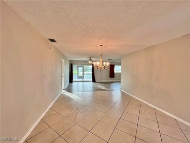 **WOW! A CORNER LOT*DBL GARAGE* AND AN EXTRA 2 SPACE PARKING on Cypress Lake Country Club in Florida - for sale on GolfHomes.com, golf home, golf lot