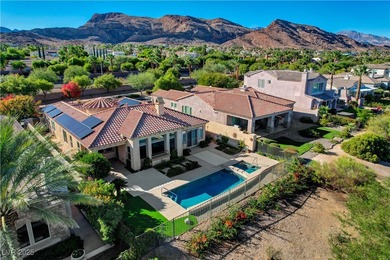 Welcome to this single-story residence located behind the gates on Red Rock Country Club in Nevada - for sale on GolfHomes.com, golf home, golf lot