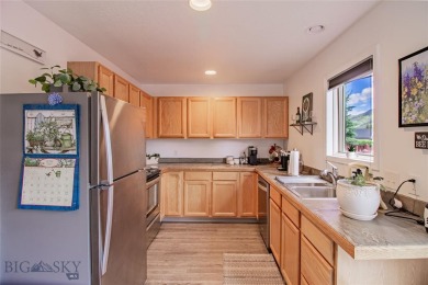 Welcome home to this low maintenance townhouse in Meadowlark on Butte Country Club in Montana - for sale on GolfHomes.com, golf home, golf lot