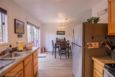 Welcome home to this low maintenance townhouse in Meadowlark on Butte Country Club in Montana - for sale on GolfHomes.com, golf home, golf lot