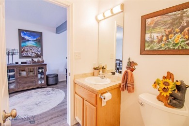 Welcome home to this low maintenance townhouse in Meadowlark on Butte Country Club in Montana - for sale on GolfHomes.com, golf home, golf lot